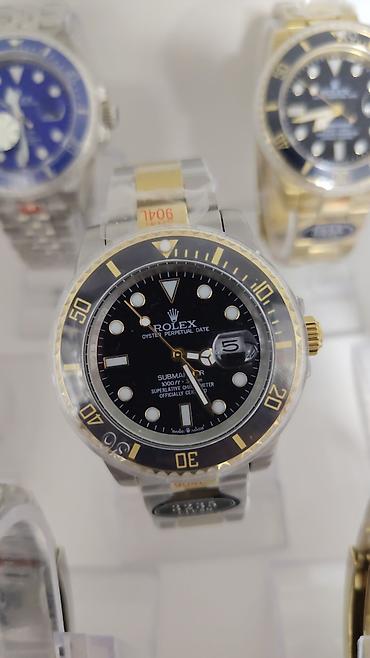 3d saat: Məhsul: Kvars mexanizimli kişi qol saatları (Rolex üslubunda) Rolex — 9