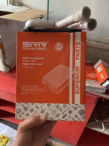 Радиатор печки (теплообменник) SRR Genuine Parts - Модель/артикул