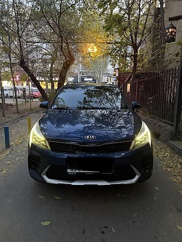 roewe ei6: Kia Rio: 2021 г., Бензин, Хэтчбэк — 1