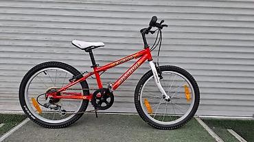 Детские велосипеды: Детский велосипед в синем цвете, оснащенный дополнительными боковыми — 12