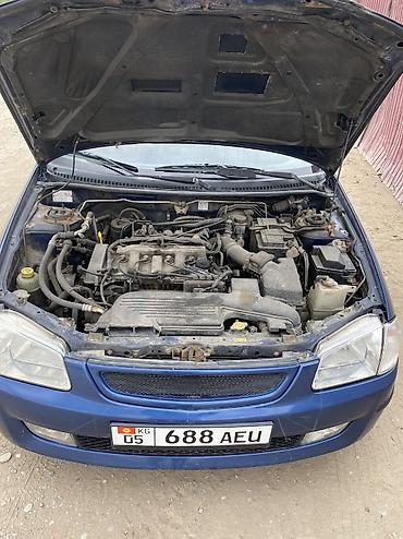 Mazda: Mazda 323: 2000 г., 1.8 л, Механика, Бензин, Хэтчбэк — 11