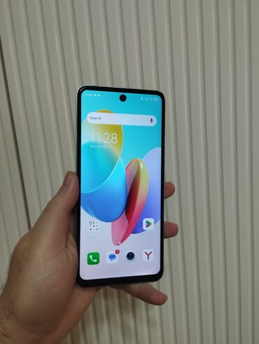 Tecno: Tecno Spark Go 2024, 128 GB, rəng - Ağ, Barmaq izi