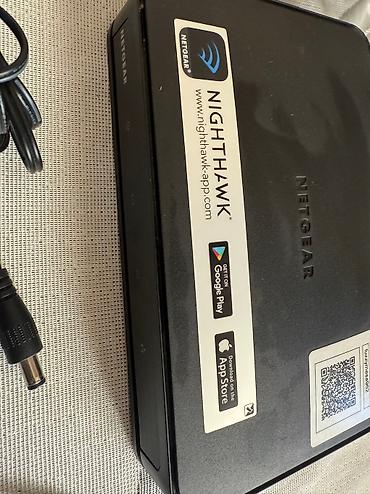 tp link 2 antenli modem: NETGEAR Cable Modem CM700 və NETGEAR Nighthawk R6020 AC750 Mbps 4 Port — 3