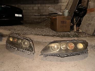 Передние фары: Передняя левая фара Mazda Оригинал — 10