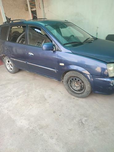 ключи б у: Kia Carens: 2004 г., 1.7 л, Механика, Бензин, Минивэн — 3
