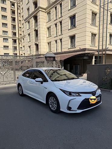 byd e2 2024: Toyota Corolla: 2024 г., 1.8 л, Автомат, Гибрид, Седан — 1