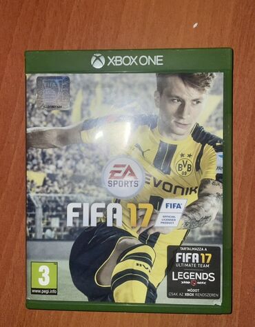 Oyun diskləri və kartricləri: Xbox One üçün FIFA 17 futbol oyunu. Bu buraxılışda FIFA Ultimate Team
