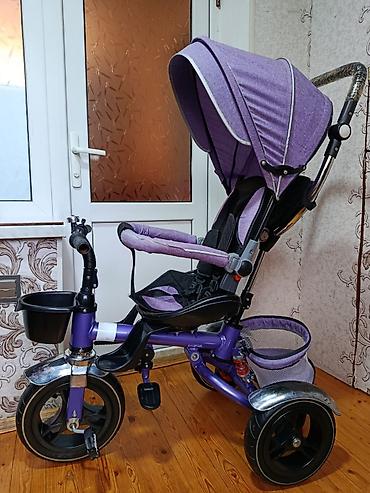 işlenmiş velosipedler: Uşaq üçtəkərli velosiped-araba, bənövşəyi rəngdə. Xüsusiyyətlər: - — 3