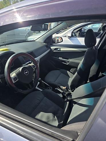 Панели, обшивки: Opel Astra H, хэтчбек/седан (интерьер) - Руль с мультимедийными — 4