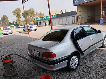 Унаа сатуу: Toyota Carina E: 1999 г., 1.8 л, Кол менен иштөөчү, Бензин, Седан — 7