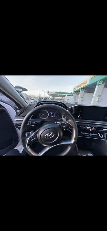 byd e9 1: Элегантный белый седан бизнес‑класса с динамичным купеобразным — 5