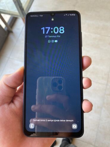 samsunq 52: Samsung Galaxy A06, 64 GB, rəng - Göy, Barmaq izi, İki sim kartlı