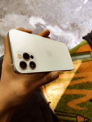 трутон: IPhone 12 Pro, Б/у, 128 ГБ, White Titanium, Зарядное устройство, Защитное стекло, Чехол, 76 % — 1