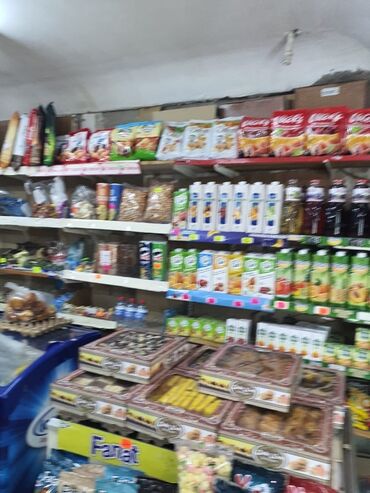 Sifarişlə market vitrinləri: Günay Market – çoxçeşidli gündəlik ərzaq və içkilər - Ünvan nişanı — 5