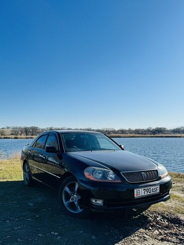 corolla runx: Продается Toyota Mark II в черном цвете. Этот седан сочетает в себе