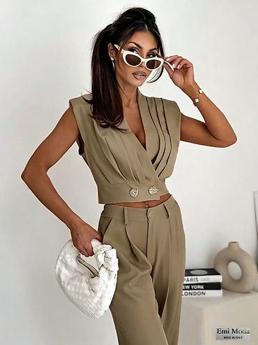 Kompleti: 🔥Ženski elegantni komplet – prsluk crop i široke pantalone
✅3200 din — 10