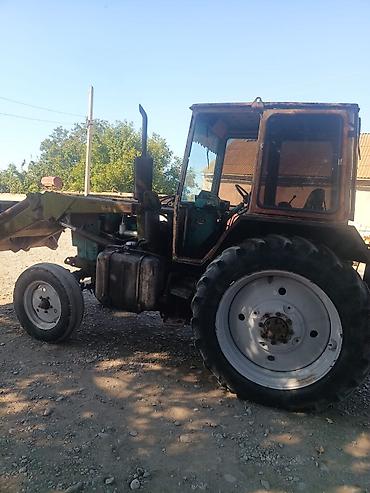 Kommersiya nəqliyyat vasitələri: Ekskavator-yükləyici traktor - Ön hissədə iri yükləmə kovası, arxa — 7