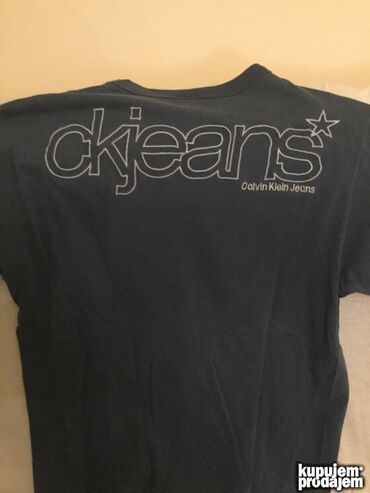 Majice: Majica na kratke rukave, L, M, Calvin Klein, bоја - Crna, Pamuk na lalafo.rs — 10 Majice: Majica na kratke rukave, L, M, Calvin Klein, bоја - Crna, Pamuk — 10