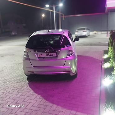 Honda: Honda Fit: 2010 г., 1.3 л, Вариатор, Гибрид, Хэтчбэк — 5
