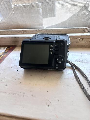 godox mini pioneer 200: Ergo DC 717 rəqəmsal fotoaparat - Kompakt korpus, daşıma qayışı ilə — 1