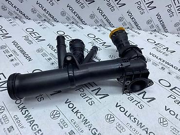 3 103: TERMOSTAT SA RACVOM ZA VOLKSWAGEN TIGUAN, TOURAN, GOLF 7 . - 04L 121 — 3