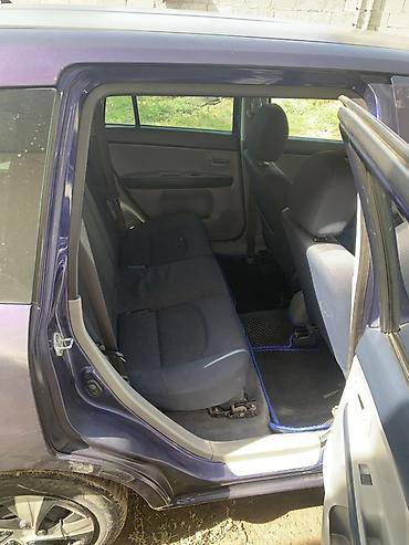 купить авто тойота камри: Mazda Demio: 2003 г., 1.3 л, Автомат, Бензин, Хэтчбэк — 10