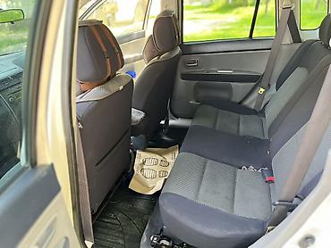 мото мини: Mazda Demio: 2003 г., 1.5 л, Типтроник, Бензин, Хэтчбэк — 10