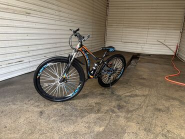 İdman velosipedləri: Ön asqılı, disk əyləcləri və möhkəm çərçivəsi olan dağ velosipedi — 14