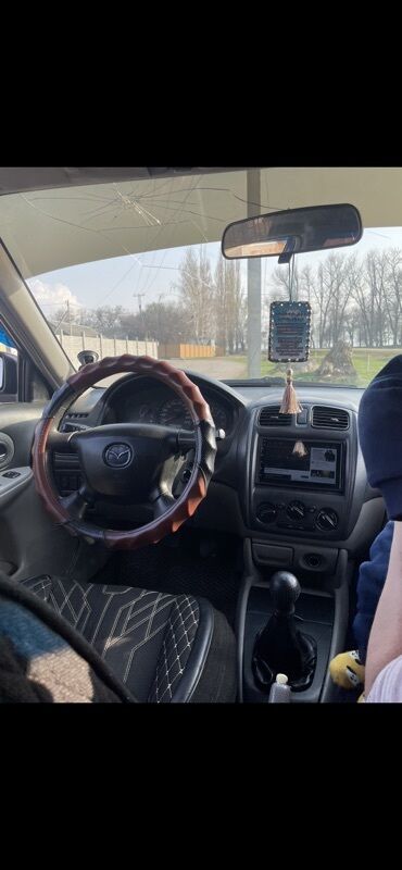 диски на нексия 2: Mazda Familia: 2003 г., Механика, Седан