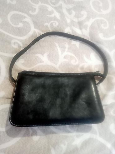 dejvid dzons torba: Tasna-NOVA

Prelepa manja tasnica, elegantna, crna — 1
