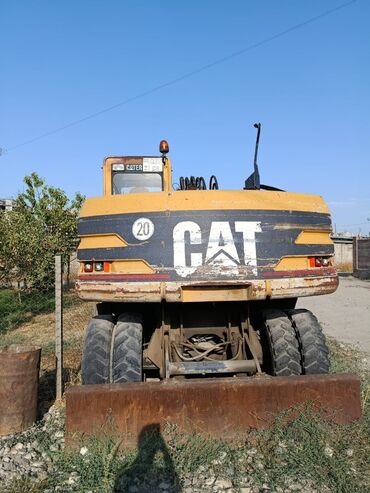 прадаю экскаватор: Экскаватор, Caterpillar, Колесный