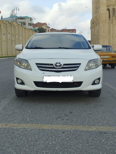 Toyota: Toyota Corolla: 1.6 l | 2006 il Sedan — 2