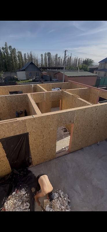 Каркасно-панельный дом из SIP/OSB в процессе строительства. - Стены