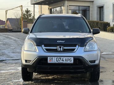 Honda: Продаю Honda CR-V Машина в отличном состояние сел поехал Зимний шины