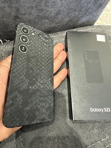Техника и электроника: Samsung Galaxy S23, 128 ГБ, цвет - Черный, Беспроводная зарядка — 2