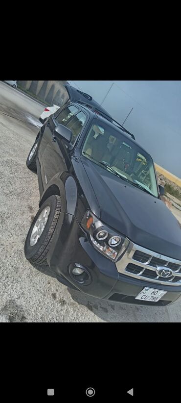 qaşınmaya qarşı maz: Mazda Tribute: 2.3 l | 2008 il Hetçbek