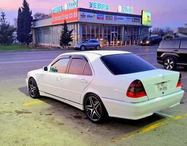 Mercedes-Benz: Mercedes-Benz 200: 2.3 l | 1997 il