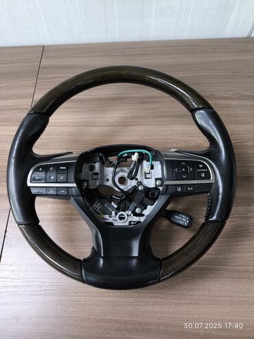 Работы по обшивке: Перетяжка рулей натуральной кожей и ЭКО кожа - Профессиональная — 6