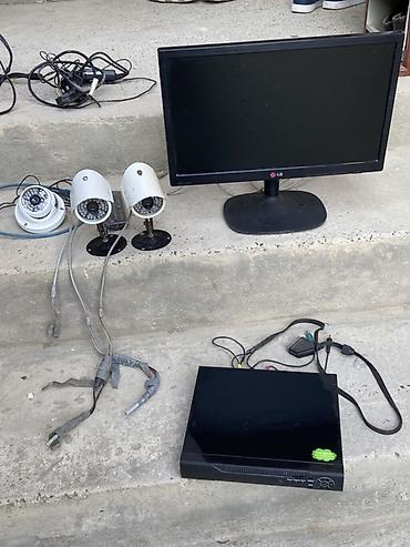 Фото и видеокамеры: Təhlükəsizlik kamera sistemi komplekti Tərkib: - LG monitor (təxminən — 1