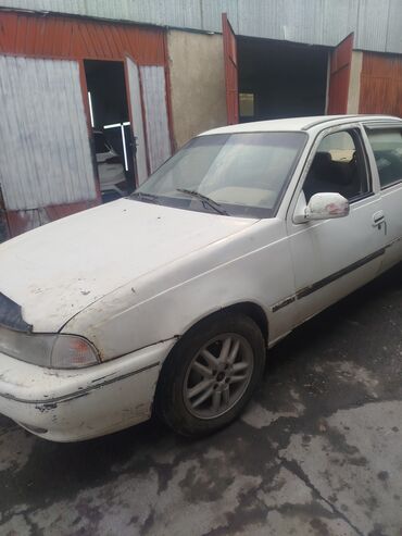 некстя 2: Daewoo Nexia, седан, белый цвет. Особенности: - Кузов седан с 4