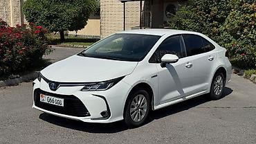 voxy noah: Toyota Corolla: 2019 г., 1.8 л, Автомат, Гибрид, Седан — 1