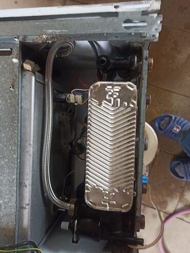 Kombilər: Demir dokum “Atron” qazla işləyən divar tipli kombi/qızdırıcı — 2