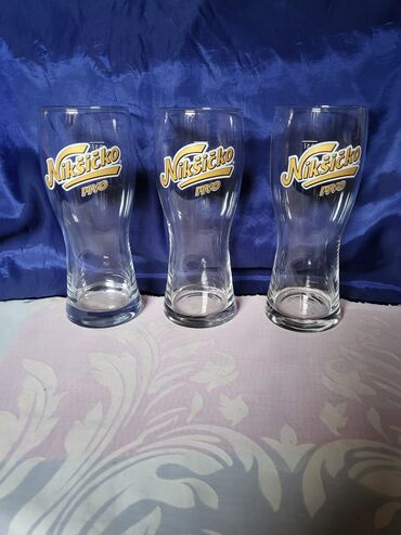 Čaše: Case nove Niksicko pivo. Nove case. sve na njima odsjaj od svetla na lalafo.rs — 6 Čaše: Case nove Niksicko pivo. Nove case. sve na njima odsjaj od svetla — 6