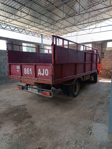 Транспорт: Продается грузовик в хорошем состоянии Исузу бортовой пяти тонник