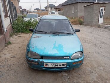 продаю автомобиль в рассрочку: Mazda 121: 1991 г., 1.3 л, Механика, Бензин, Седан