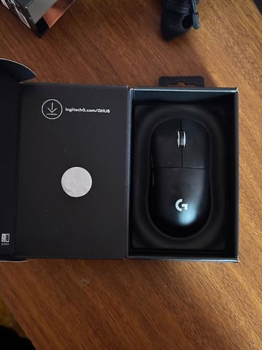 magic maus: Logitech G Pro X Superlight 2 simsiz gaming mouse. Qara rəngdədir və — 2