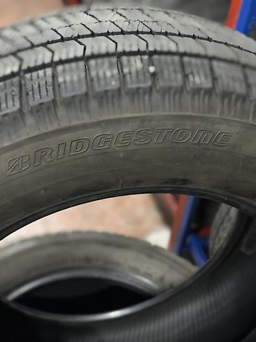 покрышки 21560 r16: Bridgestone 215/60 R16 99H XL, зимние, направленные, бескамерные. - — 2