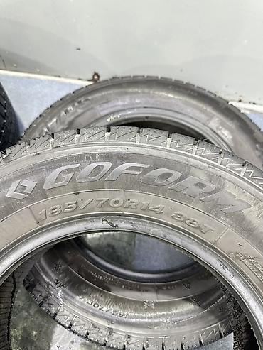 зимние шины на 14: Комплект автомобильных шин Goform размером 185/70 R14 88T. Зимние — 2