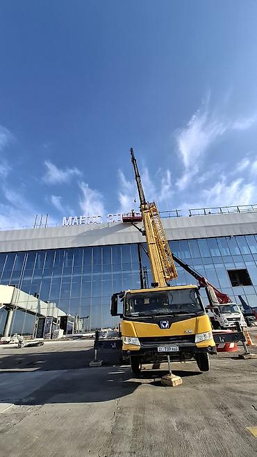 башенный кран работа: Услуги автокрана XCMG для подъёмных и монтажных работ. На фото — 2