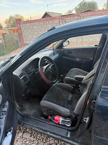 ф 10: Mazda 626: 1999 г., 1.8 л, Механика, Бензин, Седан — 5